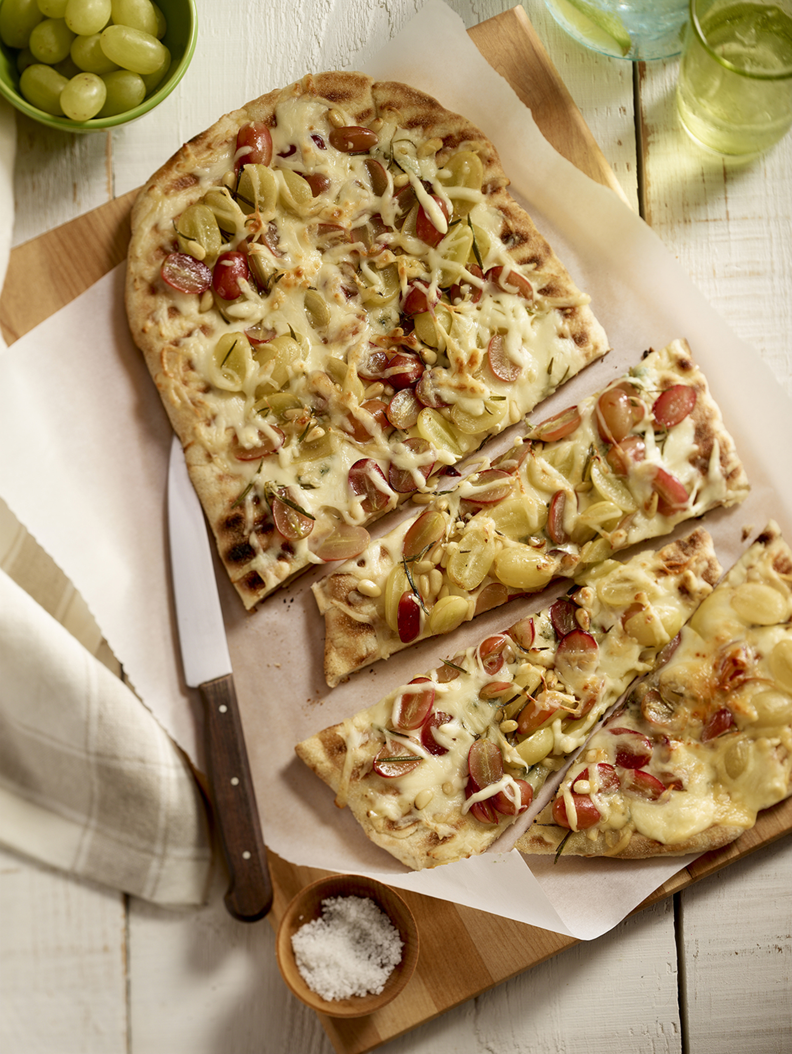 Grilled Pizza with Mozzarellissima, Grapes and Pine Nuts