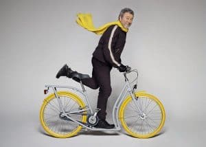 philippe-starck-on-yellow-bike