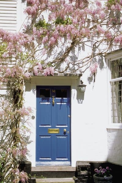 Paint your front door in a vibrant colour and add personality to your home.